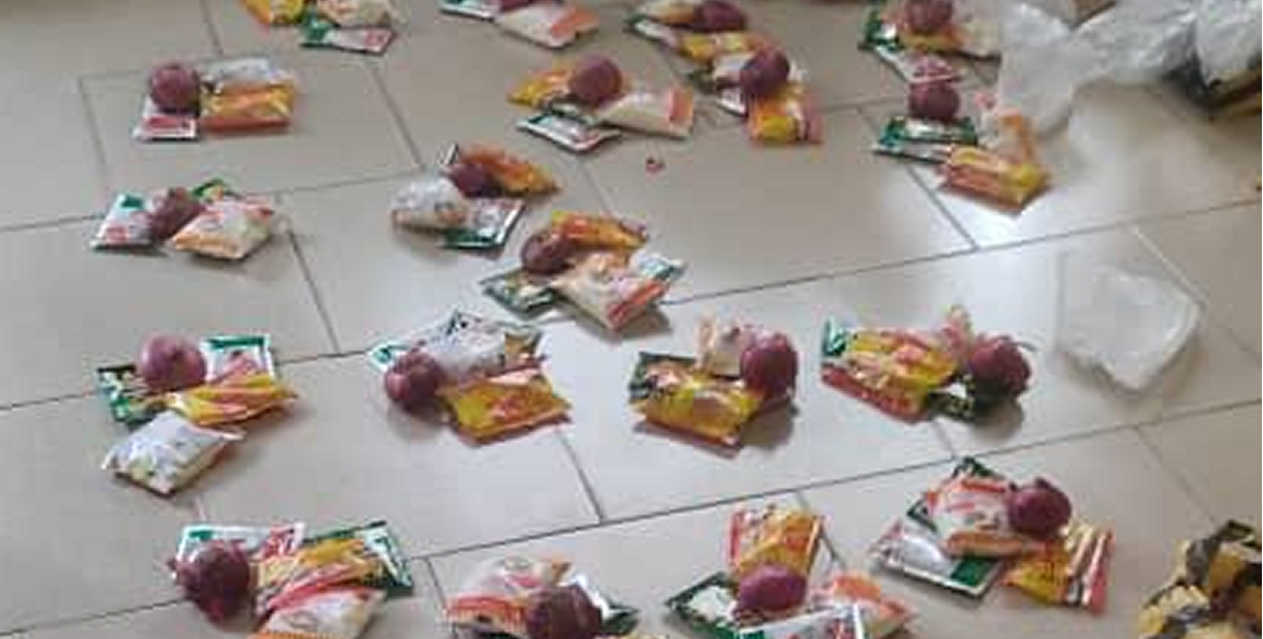 Food packages arranged on floor